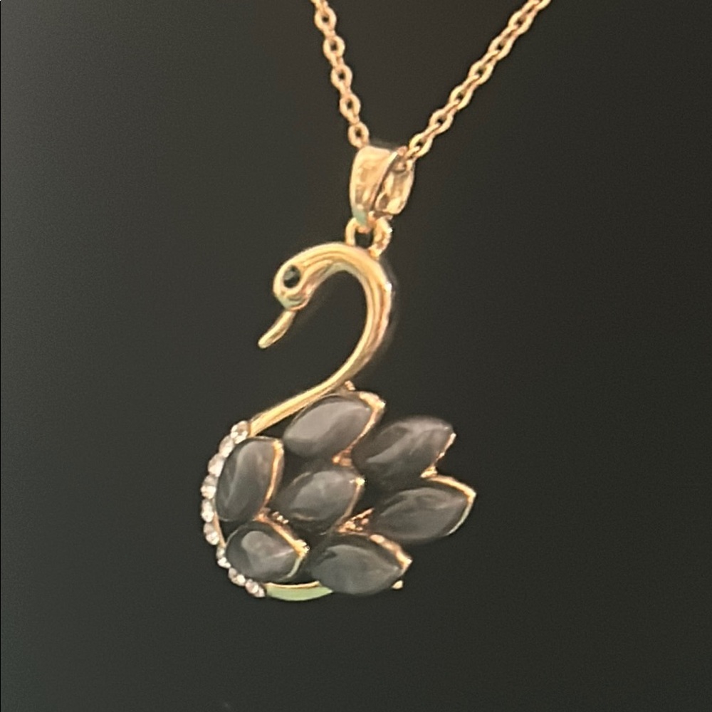 Black Glass Cat’s Eye and Rhinestone  Gold Tone Swan Pendant Necklace
